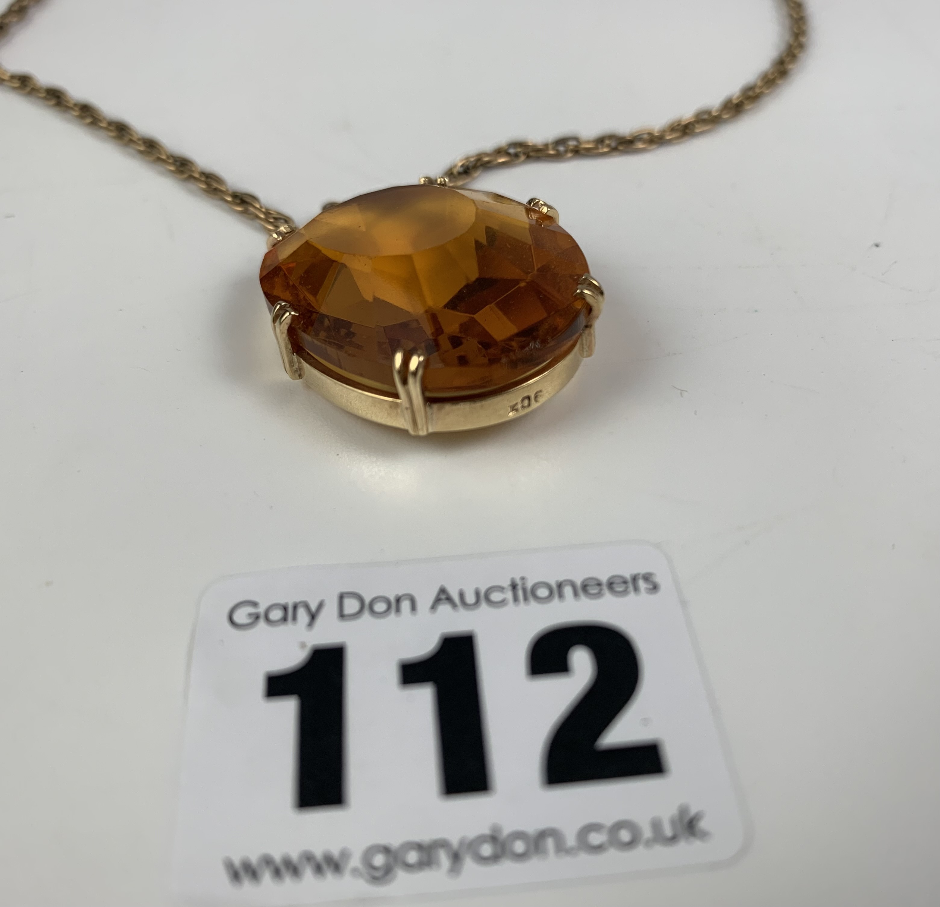 9k gold necklace, length 24” with gold framed orange topaz stone pendant 1.5” length. Total weight - Image 3 of 6