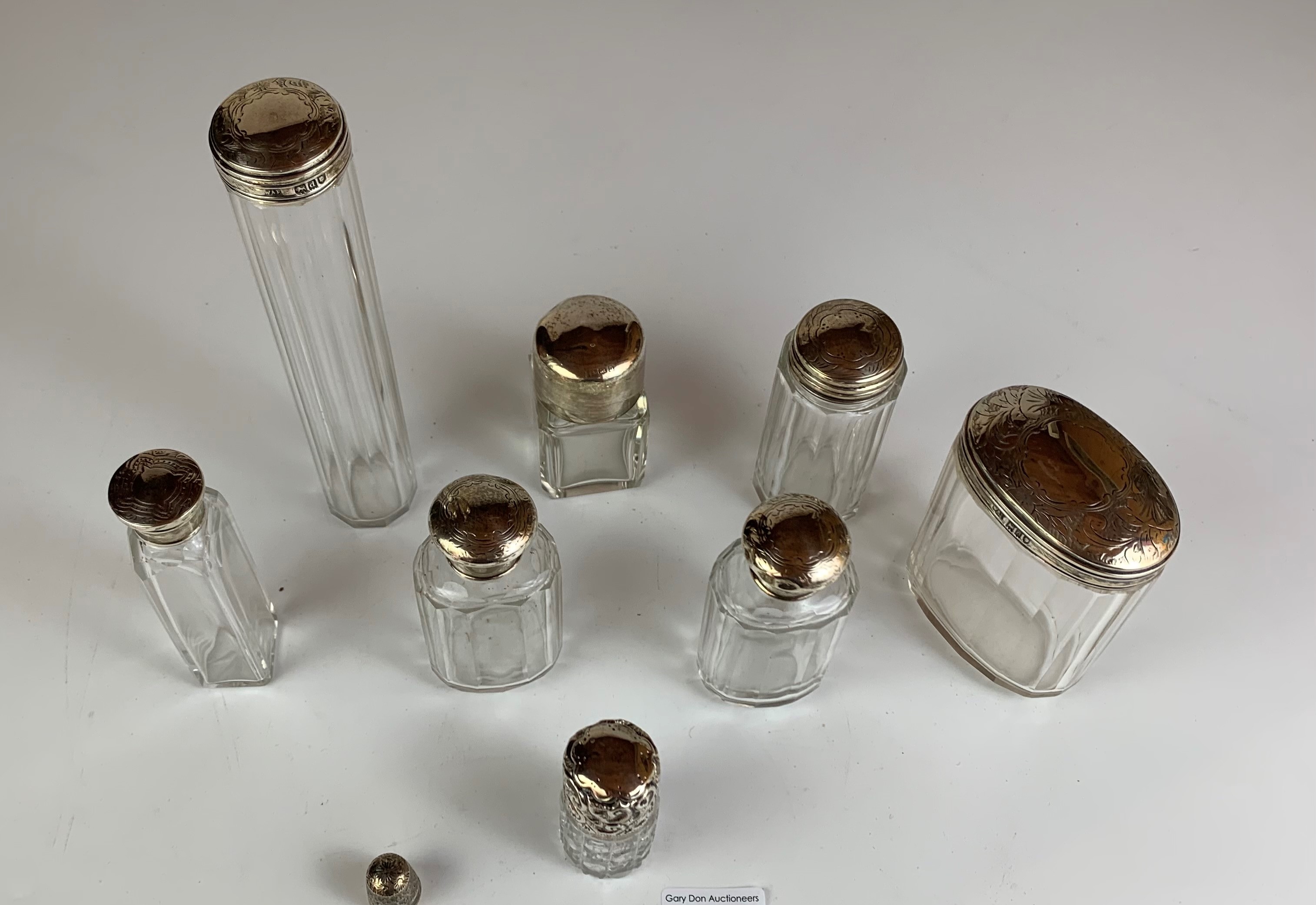 8 assorted silver topped glass bottles and silver thimble, tallest bottle 7” high - Image 3 of 6