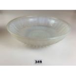 Large Vaseline glass dish with moulded exterior. 12” wide x 3.5” high