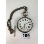 Silver pocket watch, diameter 2” with silver chain, t-bar and key, total w: 5 ozt. working