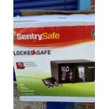 Boxed Sentry Safe and key, 0.30 cu ft, 8.49 litres