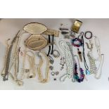 Dress jewellery including beads, pearls, watches, rings etc.