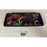 Blue Moorcroft anemone pattern oblong pin tray, 8” long x 3.5” wide. No damage
