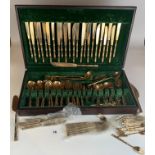 Cased canteen of bronze cutlery including 8 large knives, 8 large forks, 8 small knives, 8 small