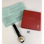 Boxed Zenith gents 9k gold watch with leather strap and receipt from 1973. Inscribed on back as