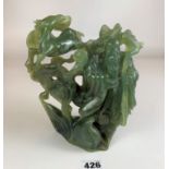 Large piece of sculpted green jade, Chinese man with deer. 8.5” high x 8” wide. Some chips and