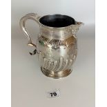 Silver jug, 6.5” high x 7” wide, w: 15 ozt., re-hallmarked by Assay Office.