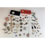 Dress jewellery including brooches, earrings, rings, souvenir spoon, odd coins and Azur watch