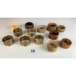 13 assorted wooden and metal napkin rings