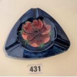 Blue Moorcroft anemone pattern ashtray, 5” triangular. No damage