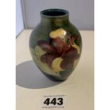 Green Moorcroft hibiscus pattern vase 3.75” high. No damage