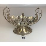 Silver pierced 2 handled dish, 9” long x 6.5” high, w: 14.6 ozt. No noticeable damage or repair