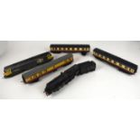 5 assorted trains, carriages and tenders including Triang and Hornby