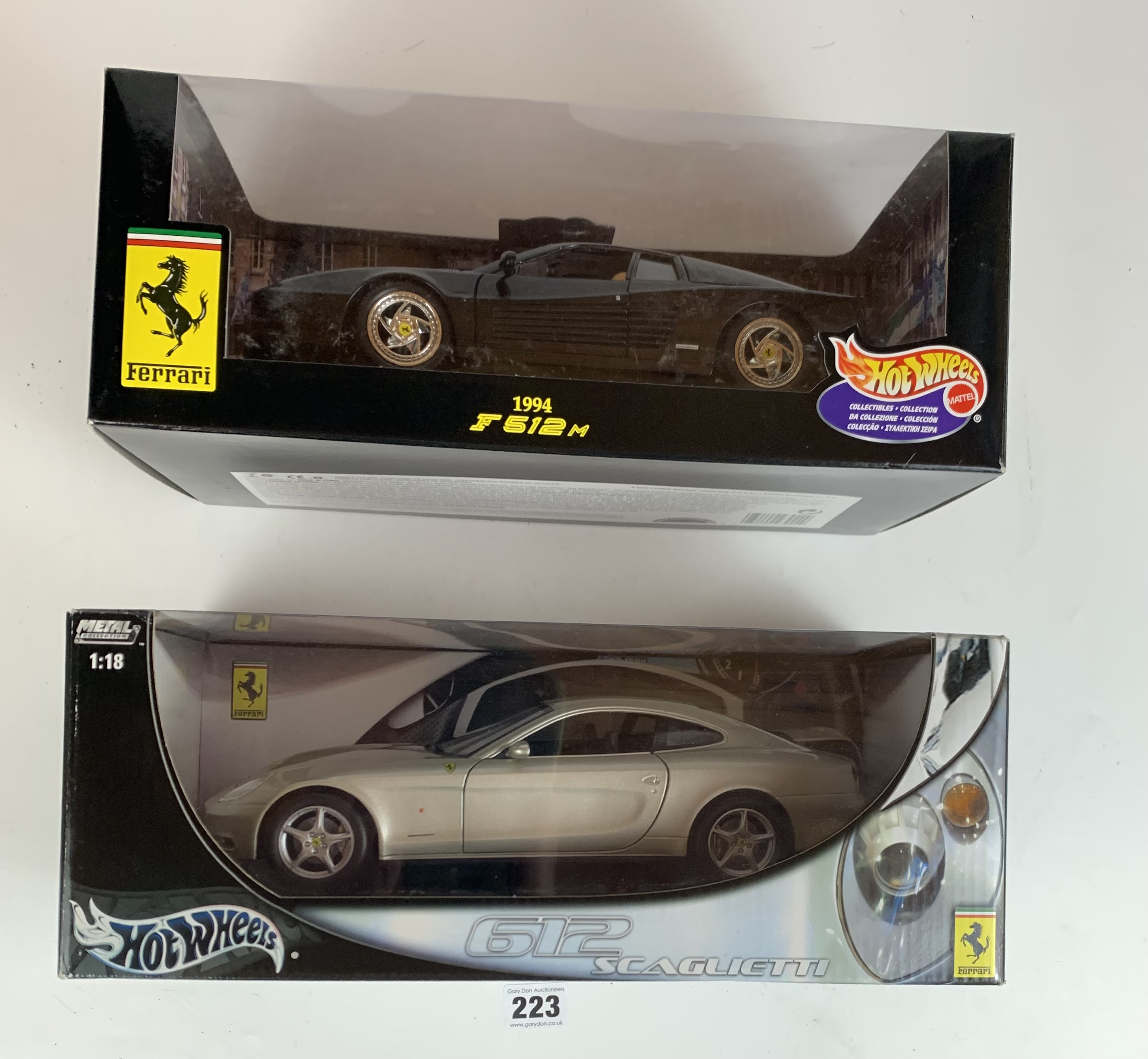 2 boxed HotWheels Ferrari 1:18 die cast cars – 612 Scaglietti and 1994 F512M