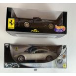 2 boxed HotWheels Ferrari 1:18 die cast cars – 612 Scaglietti and 1994 F512M