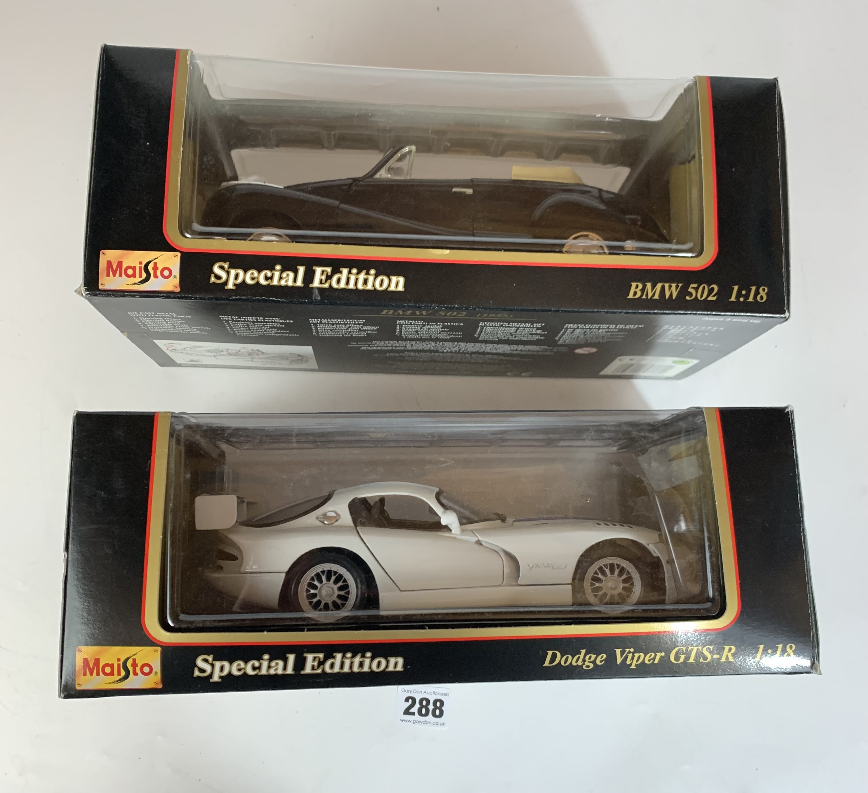 2 boxed Maisto Special Edition 1:18 die cast cars – Dodge Viper GTS-R and BMW 502