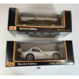 2 boxed Maisto Special Edition 1:18 die cast cars – Dodge Viper GTS-R and BMW 502