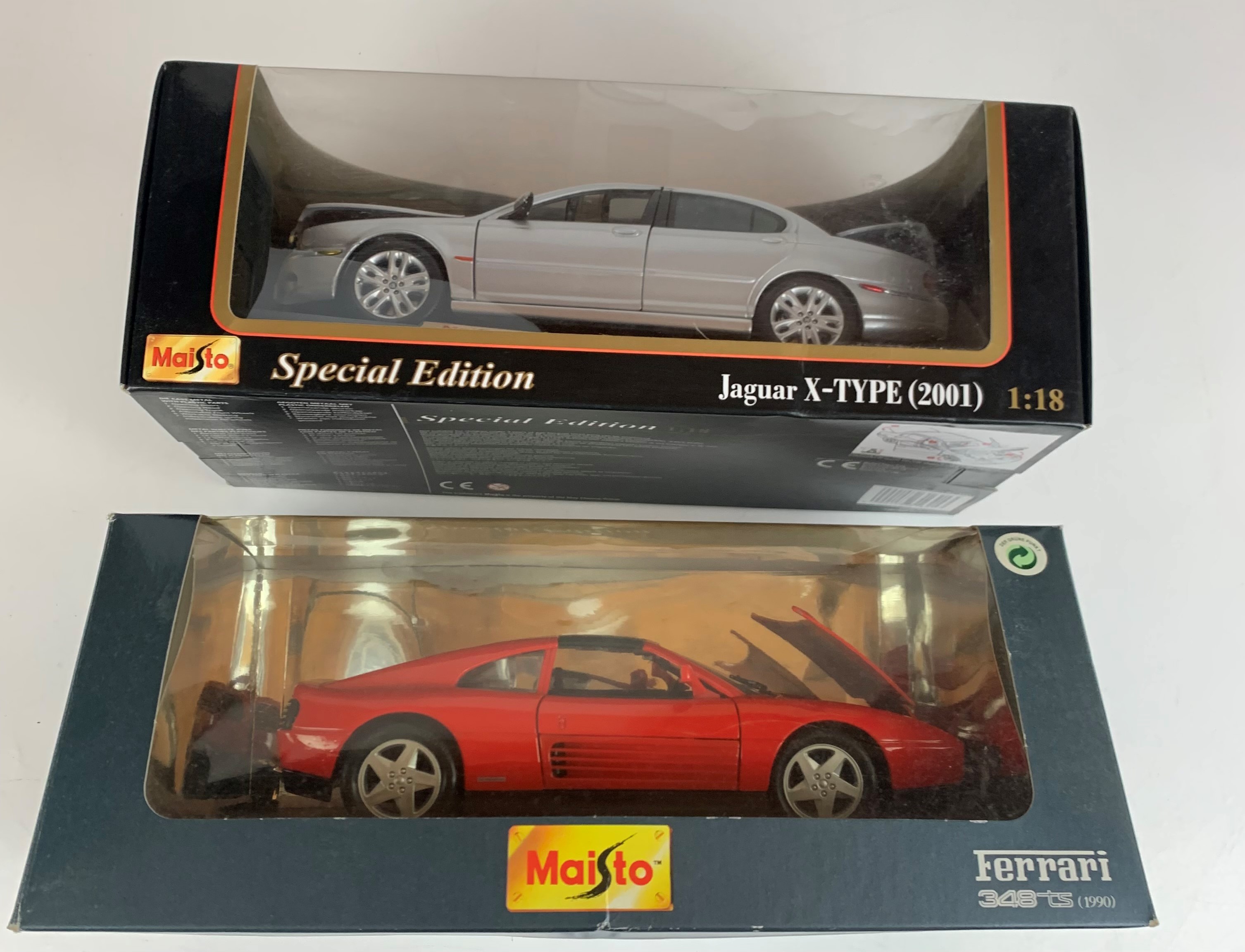2 boxed Maisto Special Edition 1:18 die cast cars – Jaguar X-Type 2001 and Ferrari 348ts 1990
