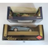 Boxed Guiloy 1:18 die cast car – Aston Martin DB7 and boxed Hotwheels 1:18 Jaguar 2000 racing car