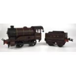 Hornby clockwork locomotive 5600 and LMS tender