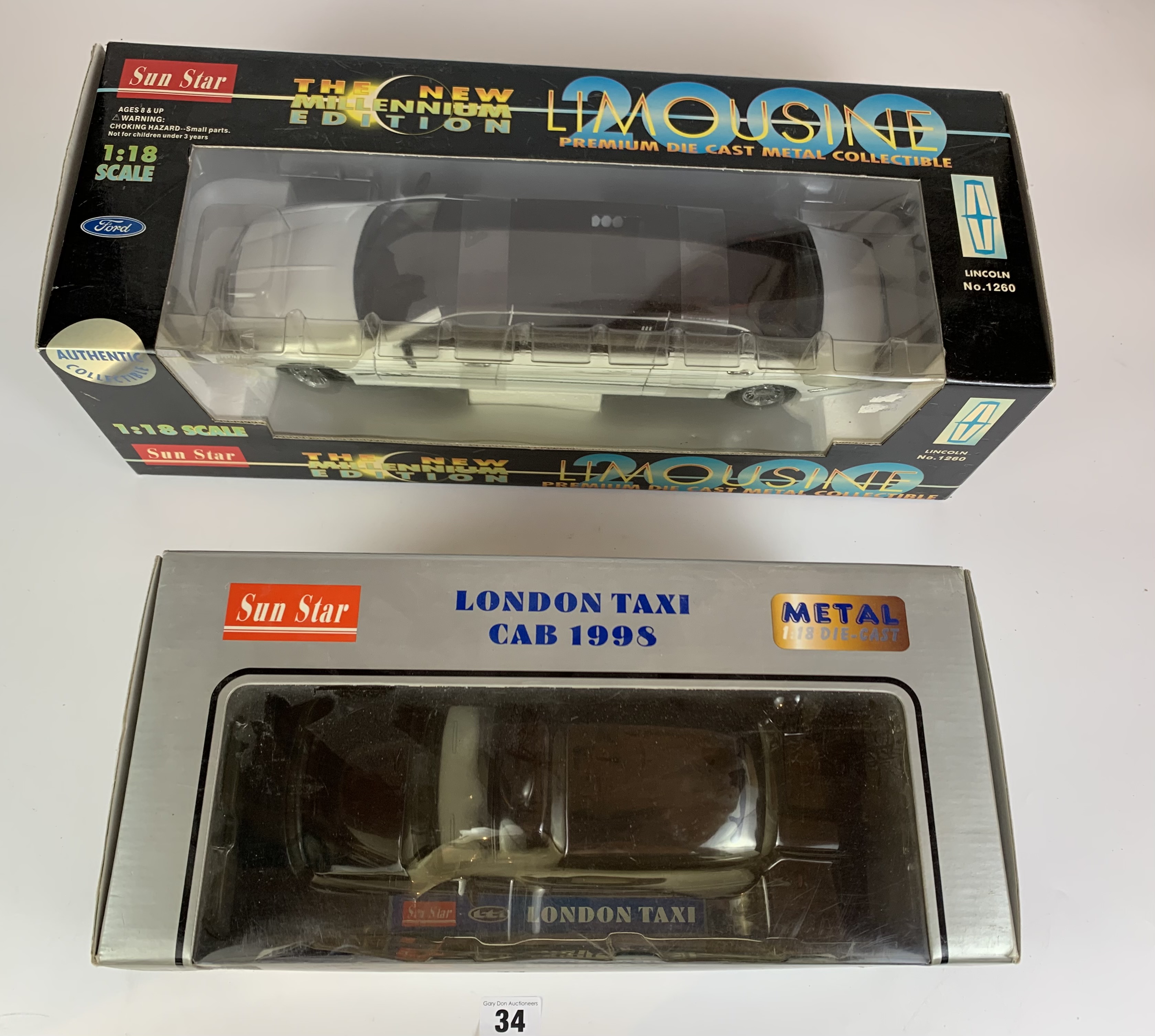 Boxed Metal Sun Star London Taxi Cab 1998 and Sun Star The New Millenium Edition Limousine 2000