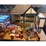 Dolls house (in need of repair) and assorted furniture with 3 small McDonalds toys