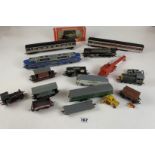 16 assorted Kitmaster and Hornby locomotives, coaches, wagons, crane etc.