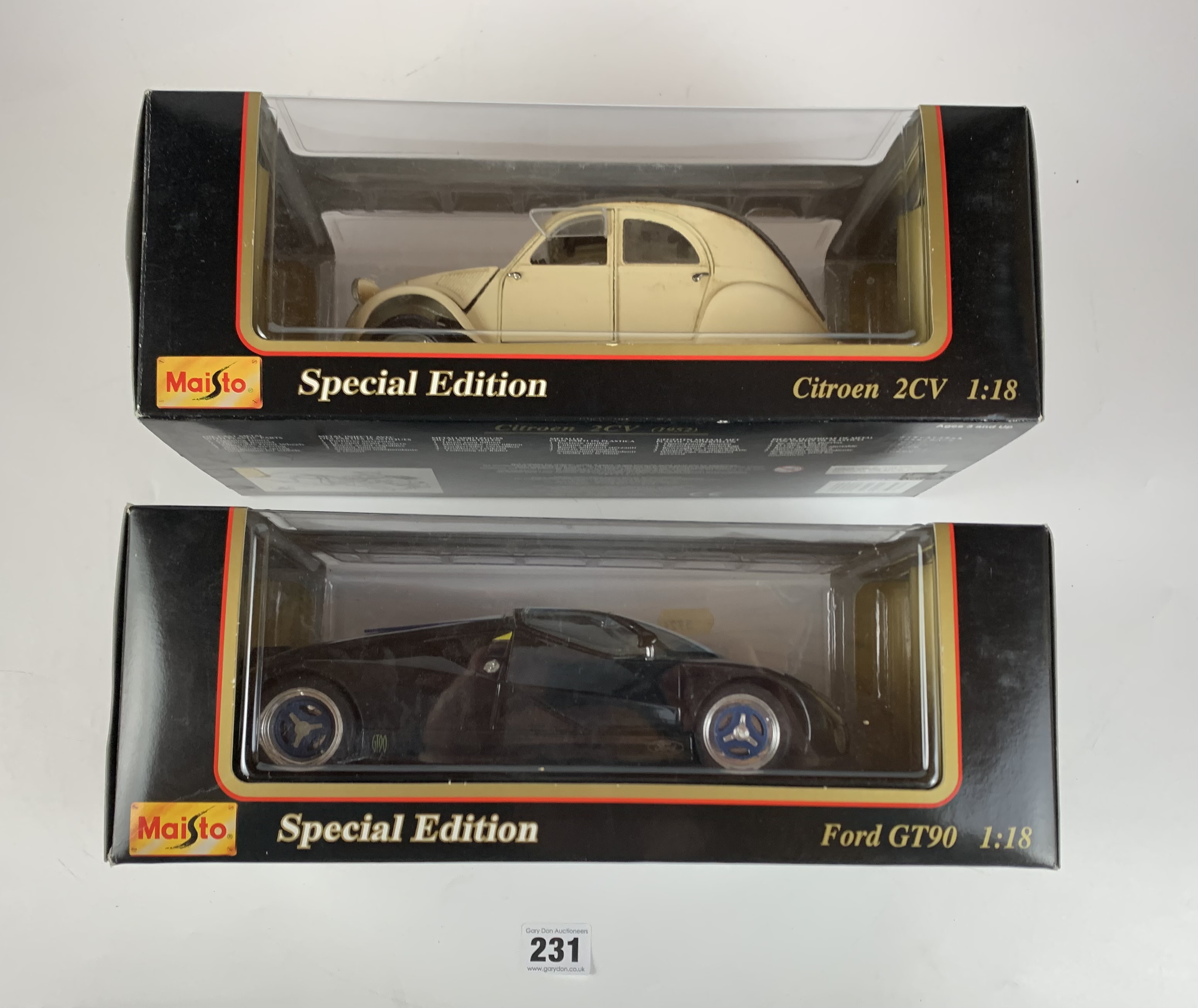 2 boxed Maisto Special Edition 1:18 die cast cars – Citroen 2CV and Ford GT90