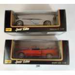 2 boxed Maisto Special Edition 1:18 die cast cars – McLaren F1 and BMW 325i