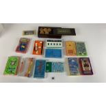 Boxed set of Draughts and 13 pocket games