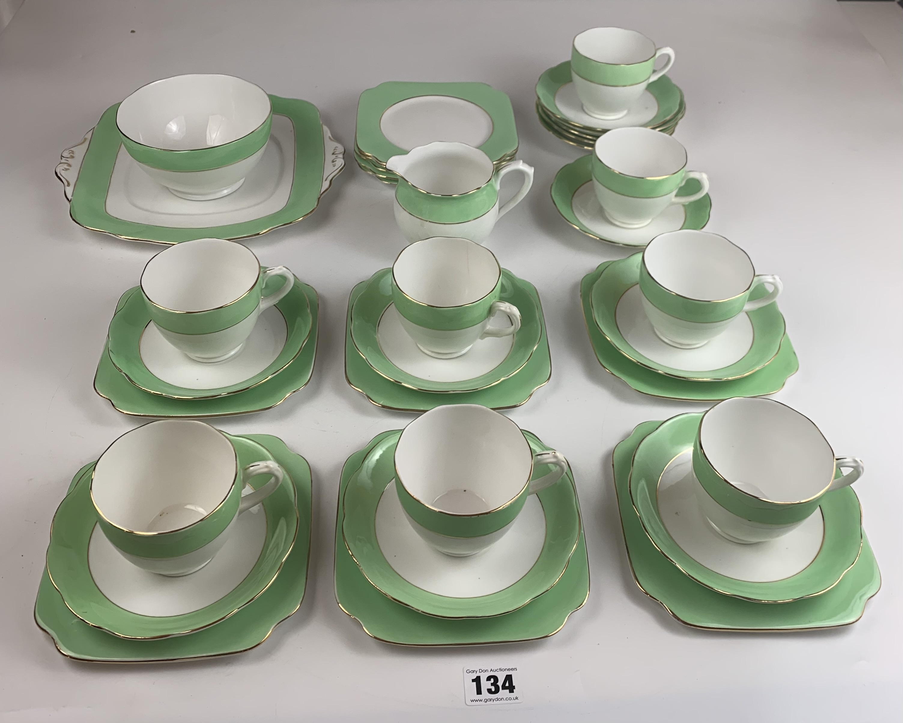 34 piece English Bone China tea service comprising 8 cups, 12 saucers, 11 side plates, 1 sandwich - Image 2 of 4