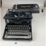 Imperial Model 50 Standard Typewriter in mint condition with instruction book and spare ribbons