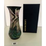 Boxed green Moorcroft vase, signed and dated 14/07/06, 8.25” high