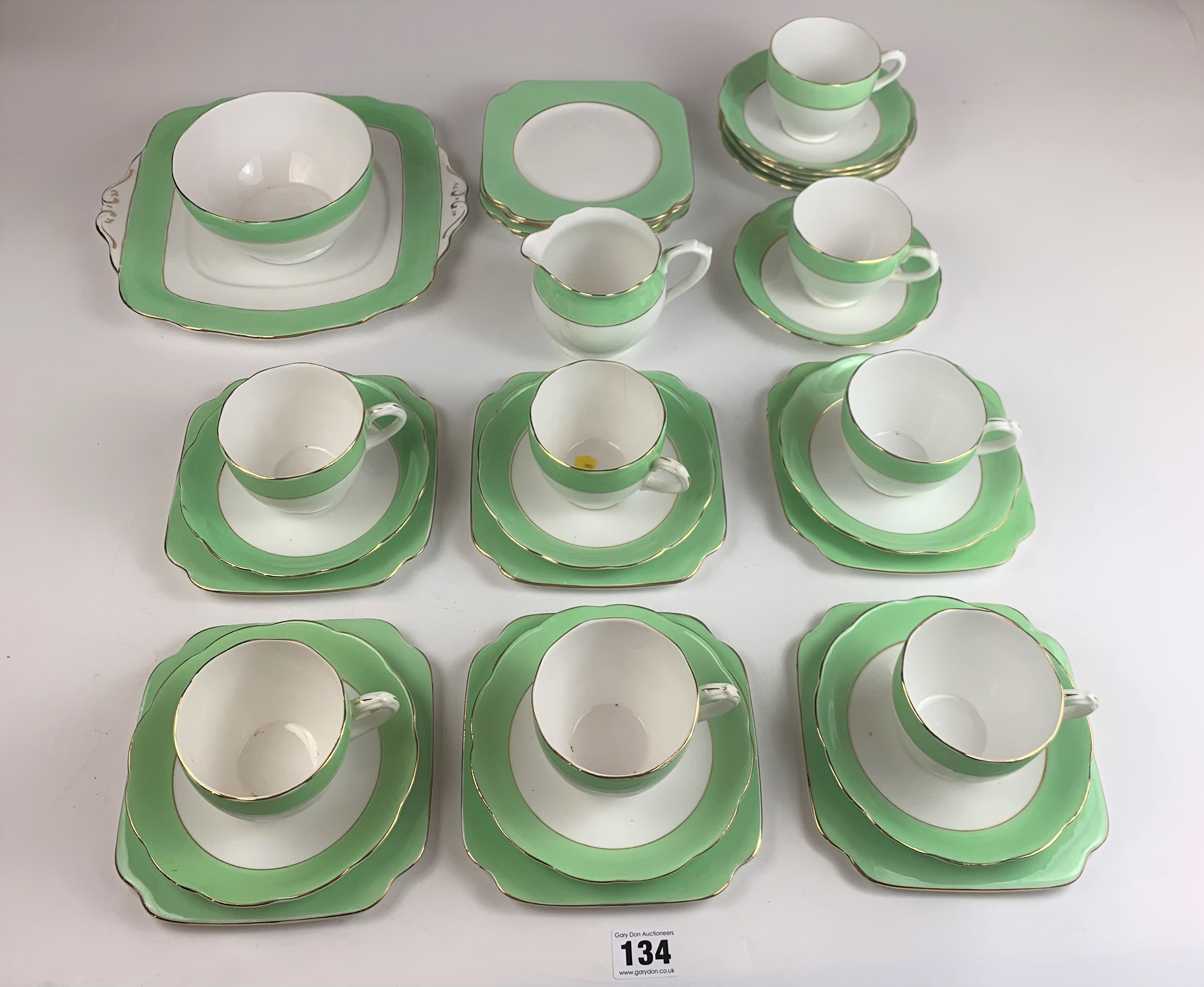 34 piece English Bone China tea service comprising 8 cups, 12 saucers, 11 side plates, 1 sandwich