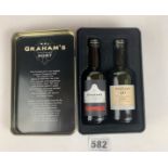 Tin containing 2 x 5cl bottles of W & J Graham’s Port – 2000 and 10 year old Tawny Port