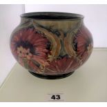 Green Moorcroft Chrysanthemum pattern bowl 5” high x 7” wide. Slight crack