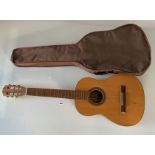 Spanish acoustic guitar with soft case