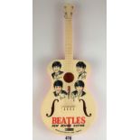 Vintage plastic Beatles guitar, 23” long