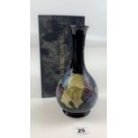 Boxed Moorcroft Anemone pattern blue vase, height 8.5”