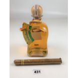 Bottle of Mirabelka Polish liqueur and Don Tomas cigar