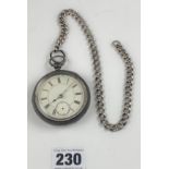 Silver pocket watch 2.25” diameter, second hand missing, with silver chain 12” long, total w: 6.2