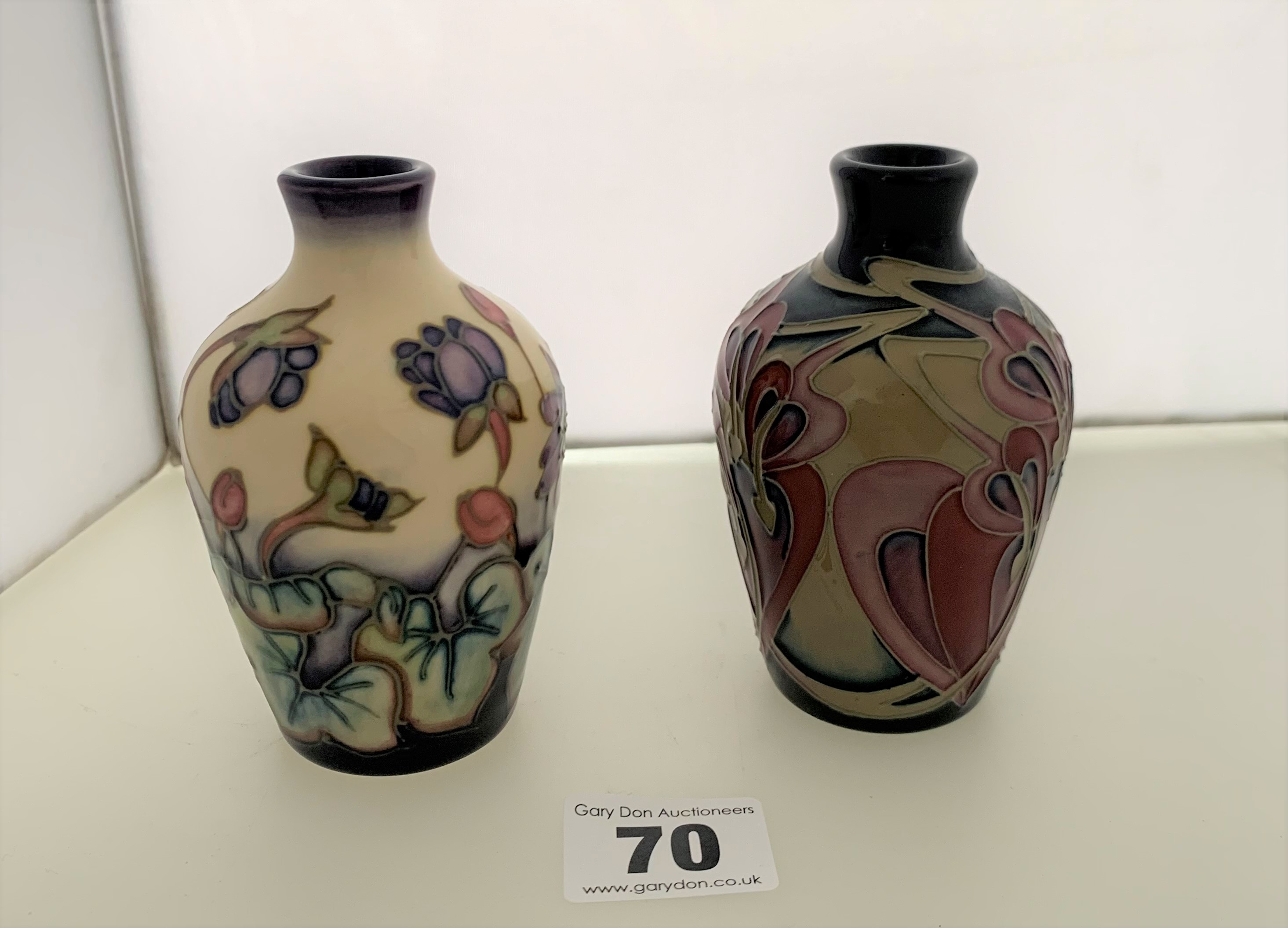 2 small Moorcroft vases 4” high, 2008 and 2009