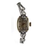 Hamilton 14k squared cased lady's bracelet watch, case no. A94071, square silvered dial with gilt