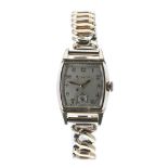 Bulova rectangular 10k rolled gold and stainless steel gentleman's dress watch, rectangular silvered