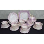 Attractive Victorian pink glaze and gilt part tea set; comprising platter 11" wide, pedestal bowl