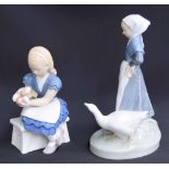 Royal Copenhagen - Figure of a girl walking with a goose, factory stamp and inscribed 528 underside,