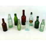Interesting collection of vintage glass advertising bottles of Weymouth and Dorset interest,
