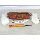 Large vintage cricket holdall with leather handles and strap, together with vintage pads, boots