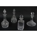 Four glass decanters including a ship's decanter, 10" high including stoper (4)