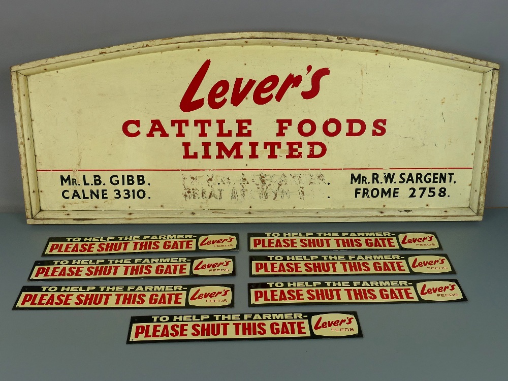 Arched wooden red and cream painted sign board for 'Lever's Cattle Foods Limited', 38" x 15.5";